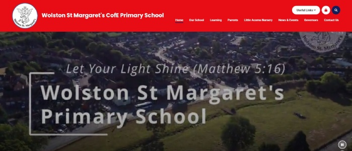 A screenshot showing the front of the Wolston St Margaret's Primary School website.